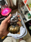 Black and gold resin cat witch figurine on pumpkin with copper accents