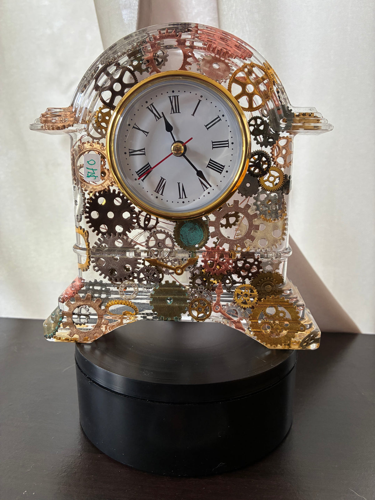 Handmade steampunk resin mantel clock with embedded gears and illuminated base