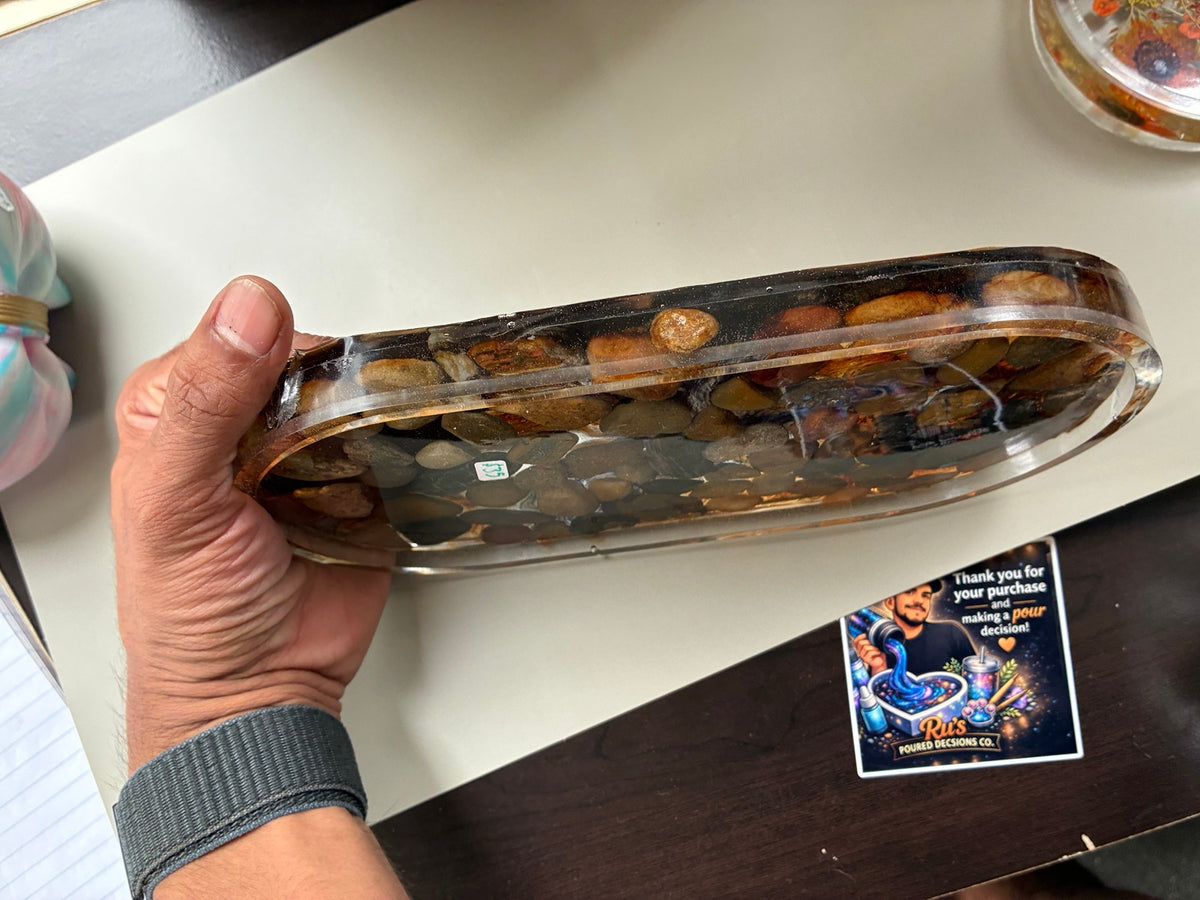 Side view of handmade river rock resin tray
