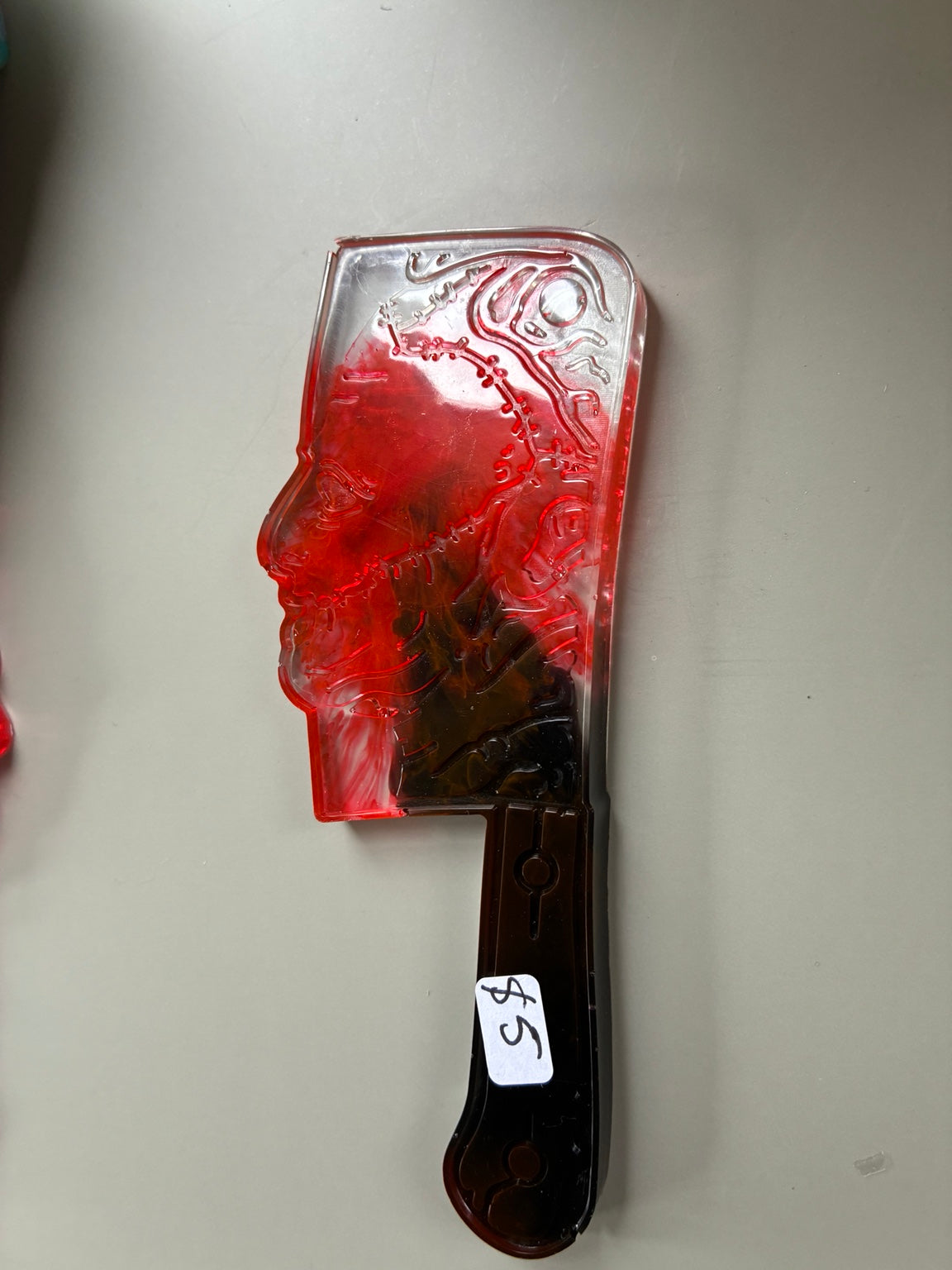Stitched Face Resin Cleaver Decoration