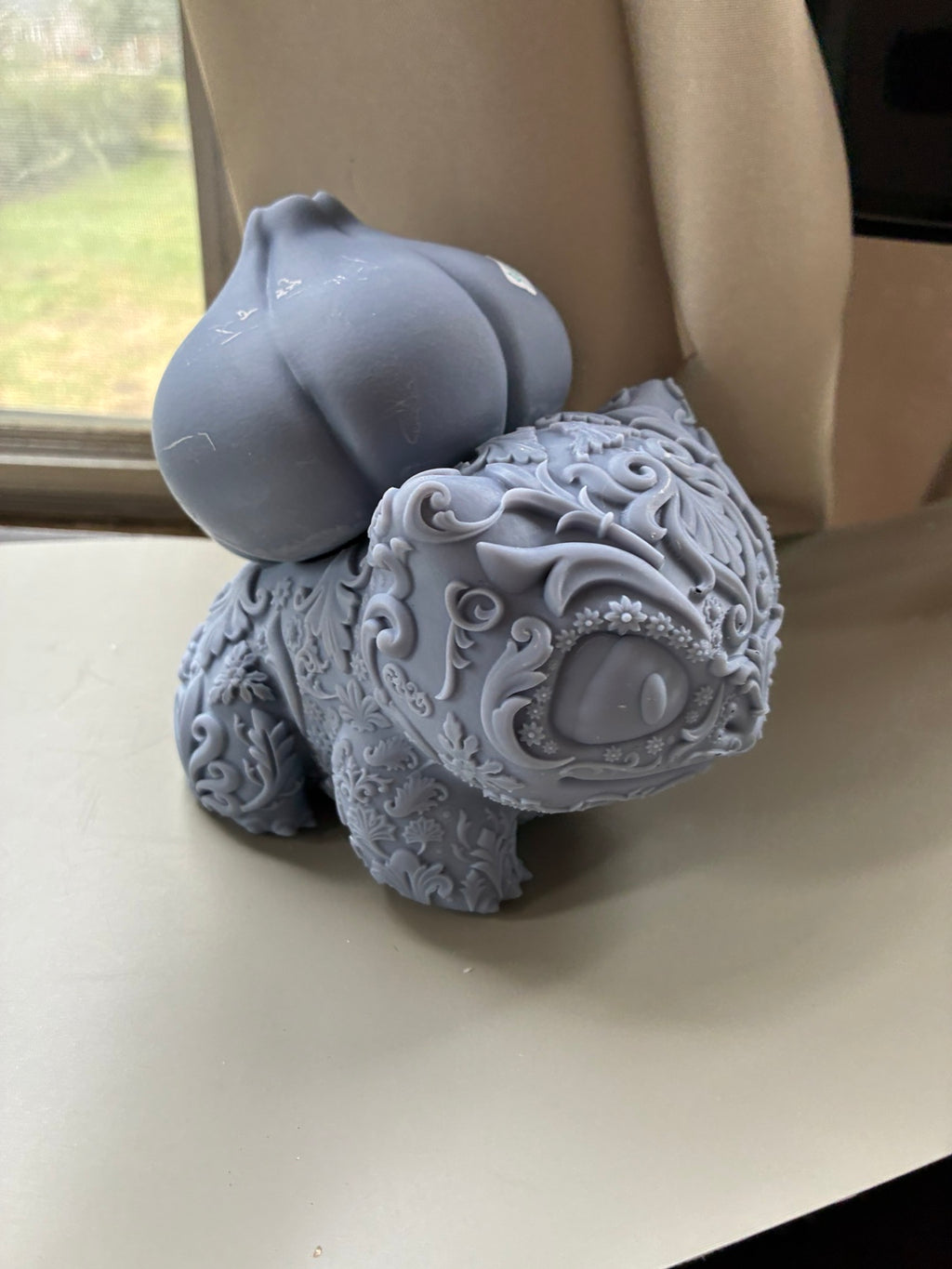 Large ornate Bulbasaur-inspired UV resin 3D printed DIY paint figure, front view