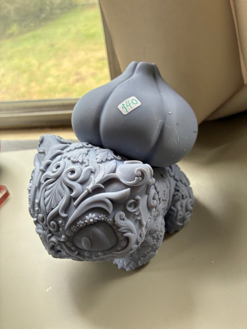 Large ornate Bulbasaur-inspired UV resin 3D printed DIY paint figure, underside view