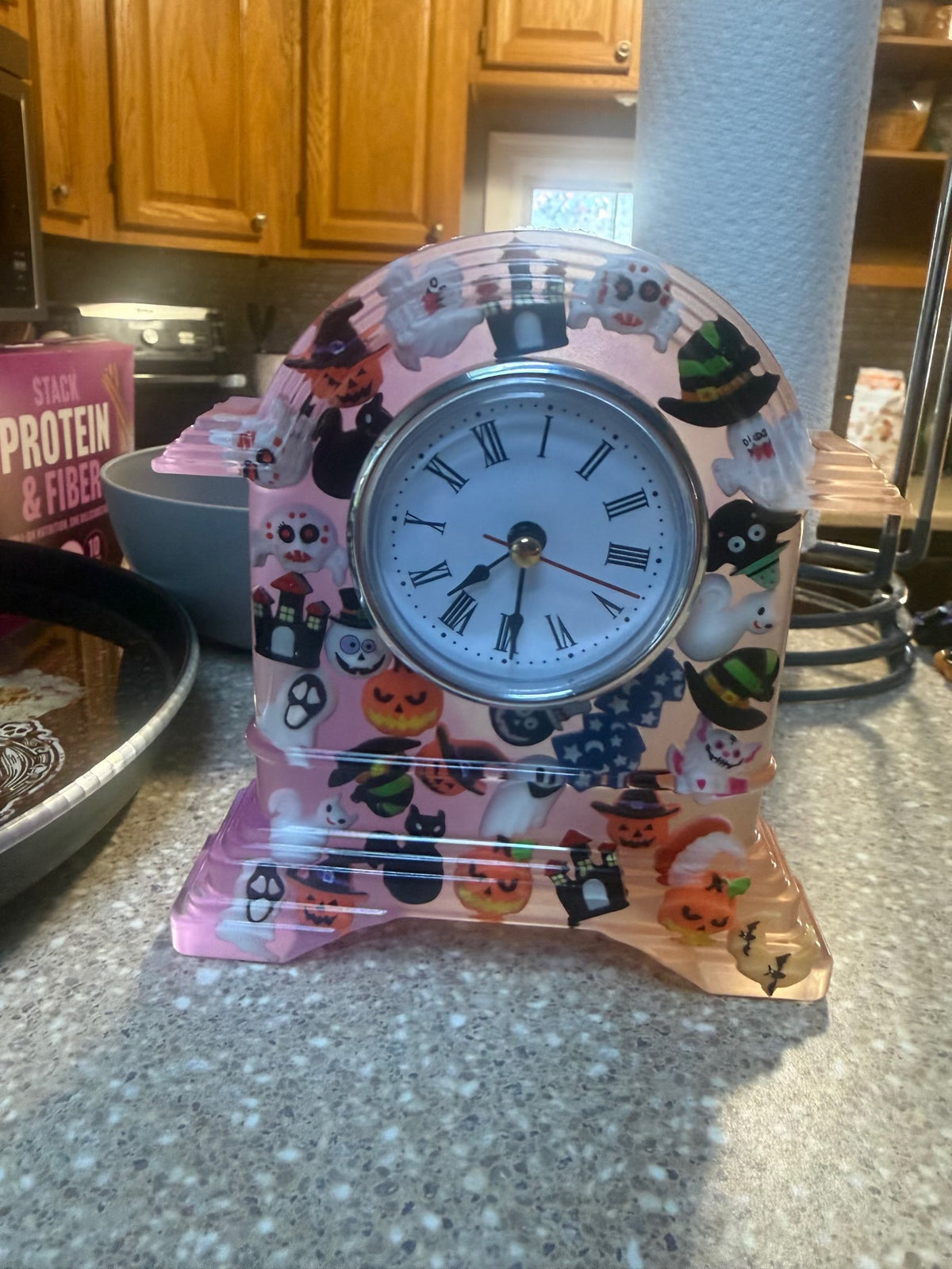 Halloween epoxy resin clock displayed upright