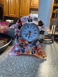 Halloween epoxy resin clock with glow-in-the-dark pigments and Halloween charms, front view