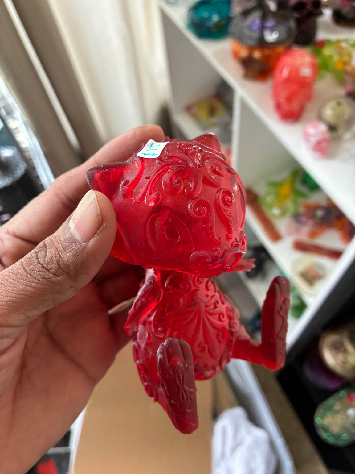 Red translucent Mew-inspired UV resin 3D printed figurine, back and side view