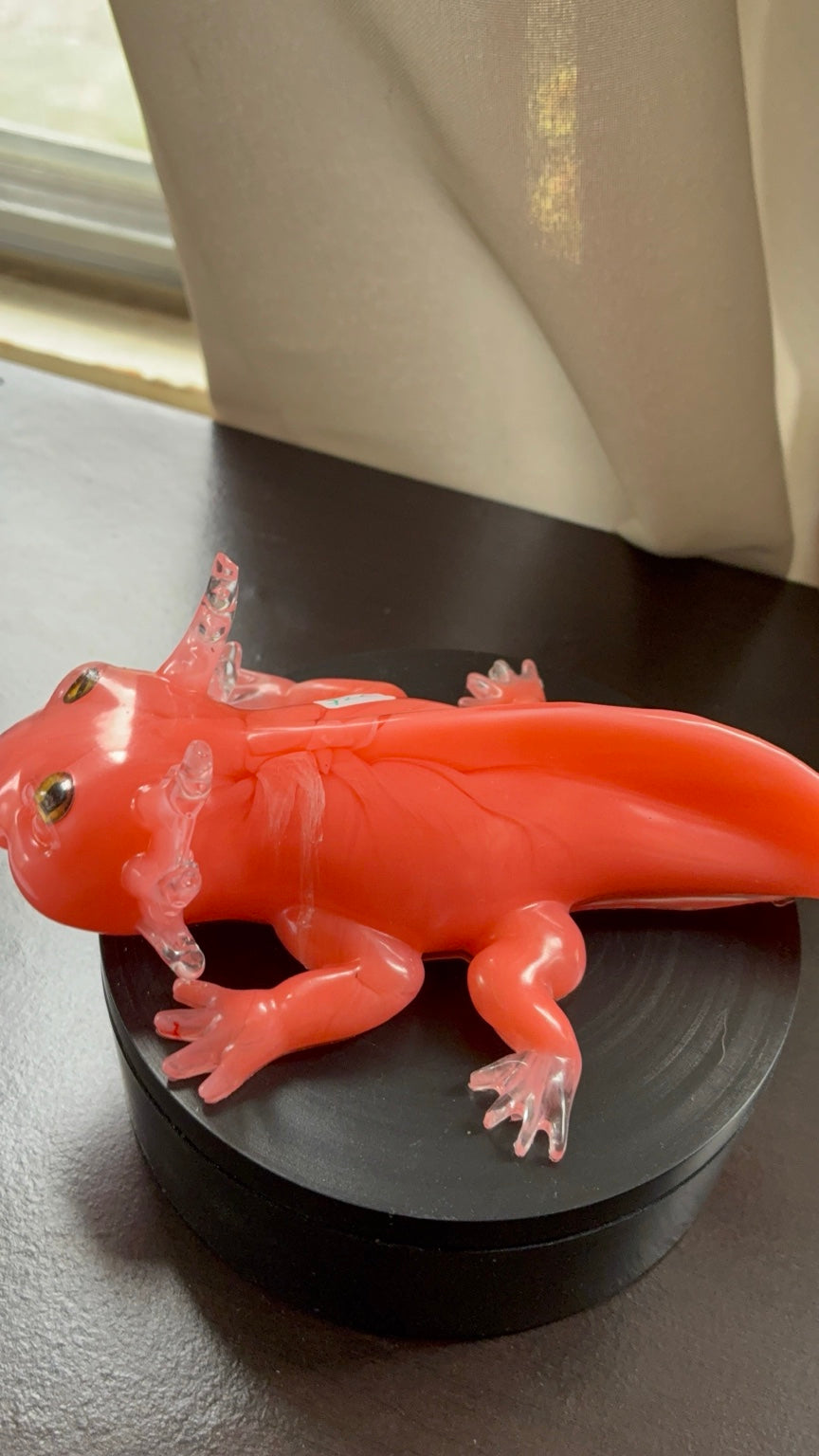 Front view of pink and clear resin axolotl with dimensional clear gills