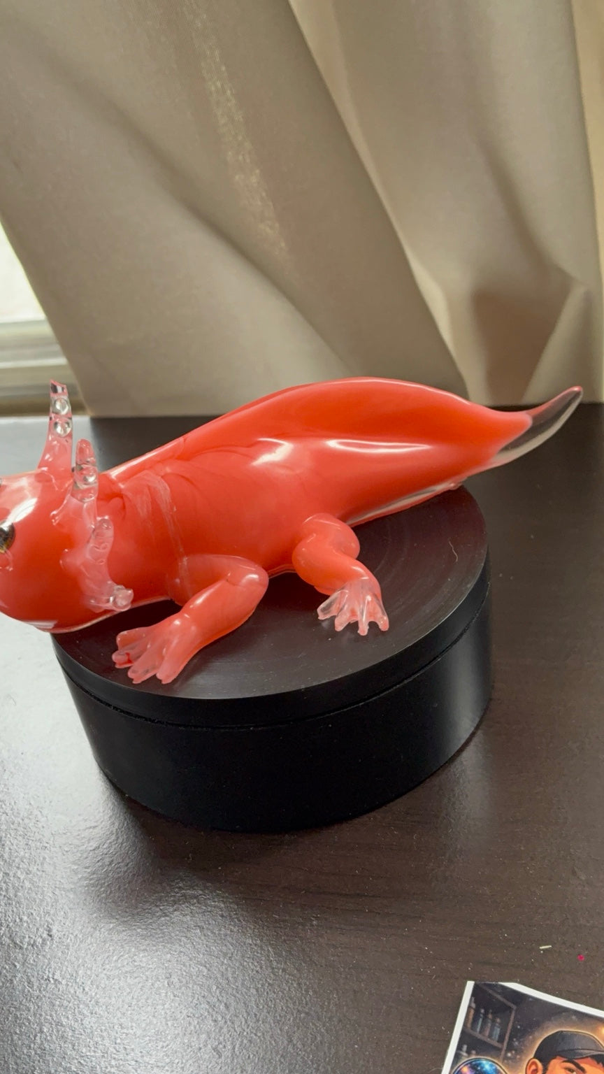 Full side profile of bright pink resin axolotl with clear accents