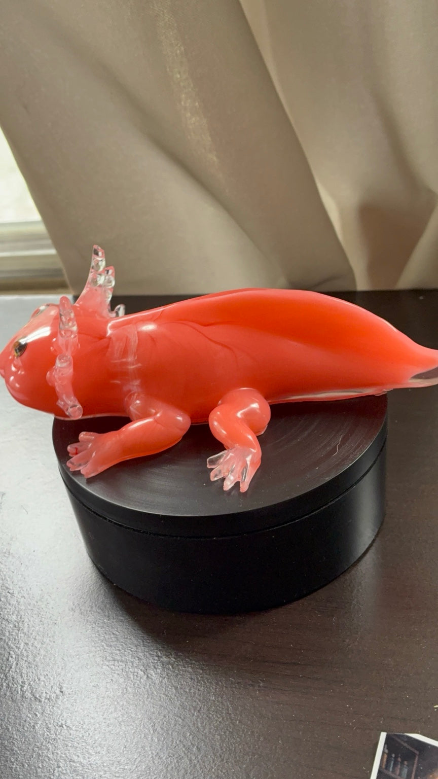 Rear angled view of handmade pink resin axolotl figurine
