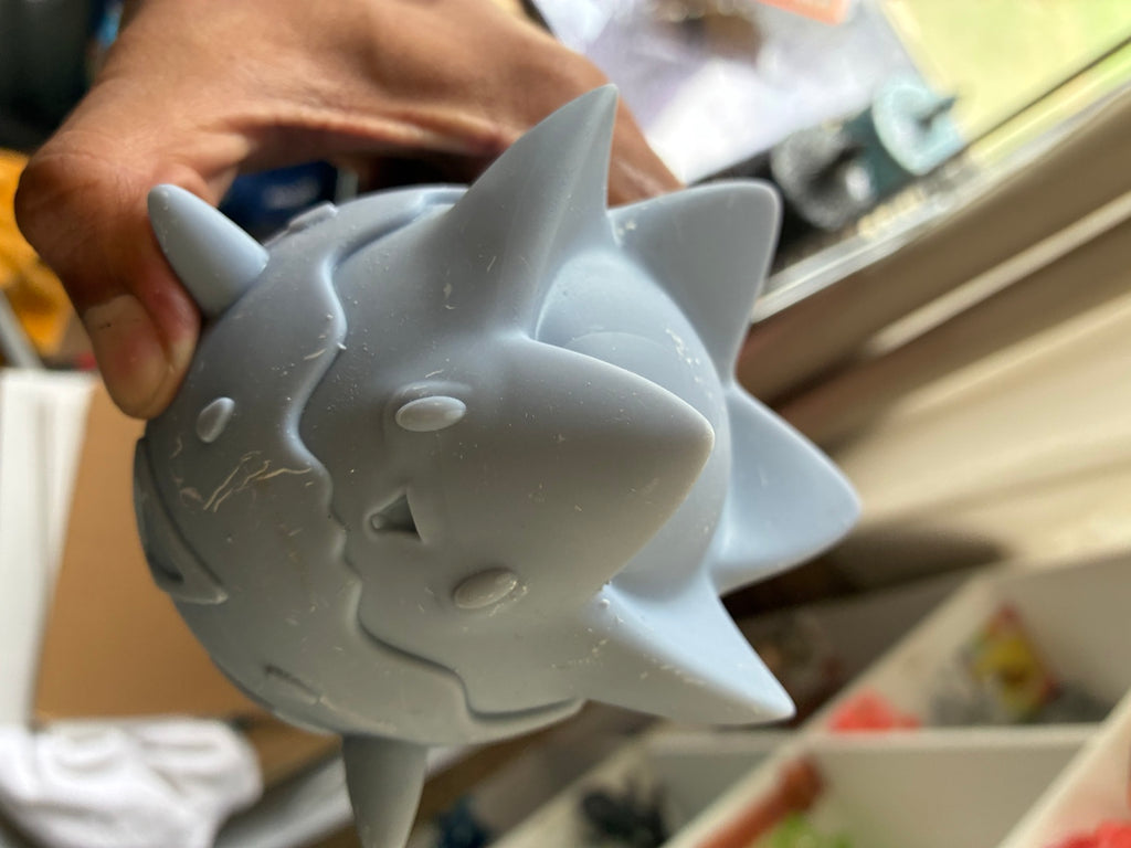 Gray solid Togepi-inspired UV resin 3D printed DIY paint figure, front close-up